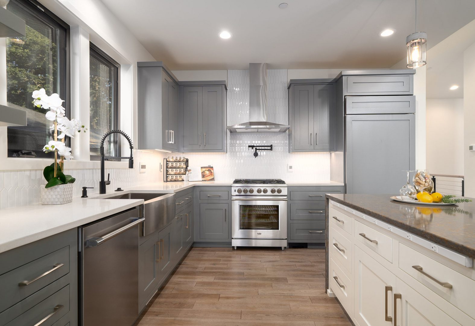 Updated kitchen with sleek new cupboards and hardware.