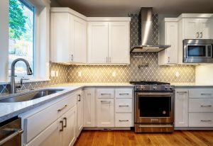 Updated kitchen with lighting under cabinets.