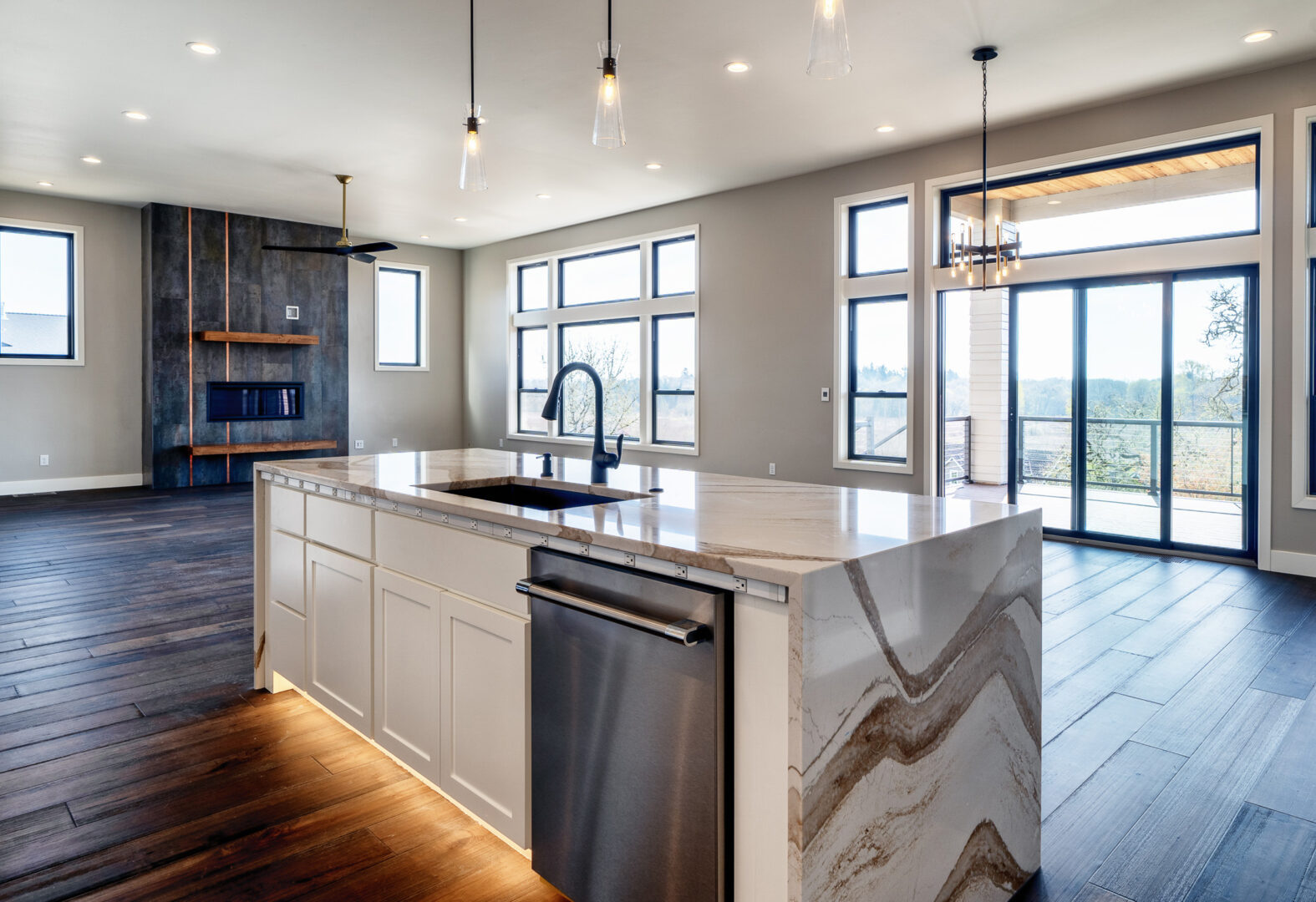 Open and spacious floor plan with kitchen sink facing out into great room.
